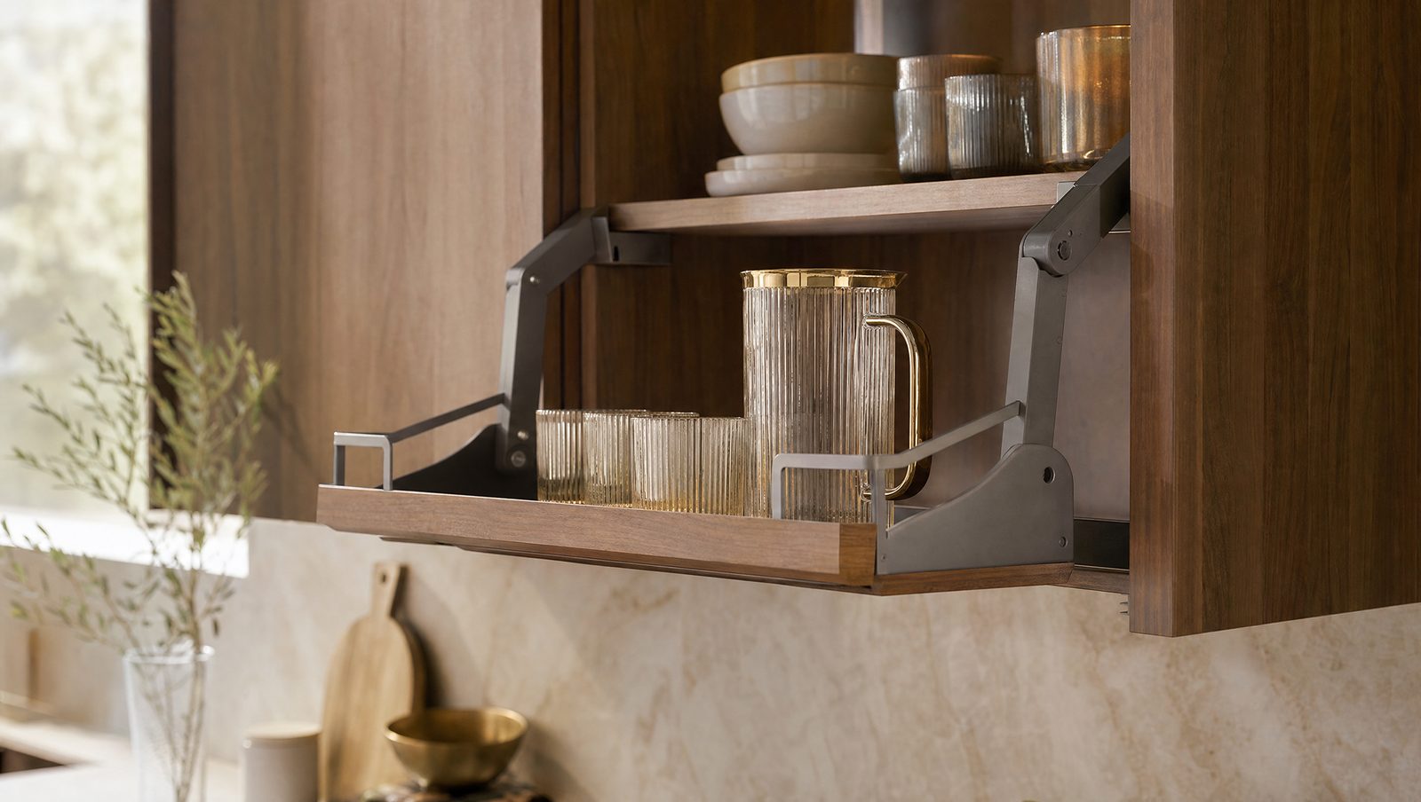 A custom upper cabinet with a pull-down shelf lowered within easy reach